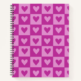 Notebook de cor rosa com quadro de verificação