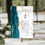 Numeração De Mesa Casamento com mármore Dourado de Teal Blue<br><div class="desc">A borda esquerda desta elegante e moderna placa de número da mesa de casamento apresenta uma cor azul-lacrimogênea, borda agitada com falso brilho dourado. A palavra "mesa" aparece em um guião de escrita manuscrita dourada sobre uma cinza e fundo de mármore branco. Adicione o número da tabela e os nomes...</div>