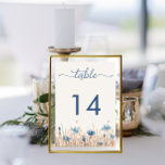 Numeração De Mesa Casamento Moderno de Campo Branco Azul de Cornflor<br><div class="desc">As flores azuis suaves florescendo em um campo macio e castanho de gramíneas secas fazem esta simples tabela numérica moderna, mas rústica e única. Quase se pode sentir a brisa suave movendo as gramíneas. Simples, mas elegante, os tons de terra e blues suaves em um fundo creme são a combinação...</div>