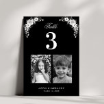 Numeração De Mesa Fotos da Infância Casamento Negro Gótico<br><div class="desc">Decorre sua mesa de casamento com este cartão numérico, com fotos florais brancas e pretas, noiva e noiva e texto personalizado de sua escolha. Adicione facilmente seus próprios detalhes clicando na opção "personalizar". 🌸 NOTA: o tamanho desta placa é de 3, 5" x 5". Se você quiser um tamanho maior,...</div>