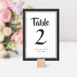 Numeração De Mesa Glittery Bat Mitzvah Black and Silver<br><div class="desc">Este número da tabela Bat Mitzvah de tendência apresenta brilho falso cintilante em camadas sobre um fundo de cor sólida. Use o formulário modelo para adicionar suas próprias informações. A Ferramenta Design pode ser usada para alterar o estilo,  a cor e o layout da fonte.</div>