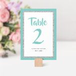 Numeração De Mesa Glittery Bat Mitzvah Teal and Silver<br><div class="desc">Este número da tabela Bat Mitzvah de tendência apresenta brilho falso cintilante em camadas sobre um fundo de cor sólida. Use o formulário modelo para adicionar suas próprias informações. A Ferramenta Design pode ser usada para alterar o estilo,  a cor e o layout da fonte.</div>