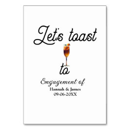 Numeração De Mesa Let's toast to engagement party name date glass