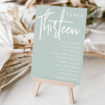 Numeração De Mesa Mesa com script manual TRINTE   Nomes de convidado<br><div class="desc">Cartões simples e chic em Sage Green e White fazem uma declaração elegante no seu casamento ou evento. Design apresenta "mesa [number]" em uma combinação de olhares de serif clássica e de caracteres de script manuscritos, com nomes individuais de convidados por baixo. Design repete-se de ambos os lados. Cartões numerados...</div>