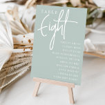 Numeração De Mesa Mesa com Script Mão OITO   Nomes de Convidado<br><div class="desc">Cartões simples e chic em Sage Green e White fazem uma declaração elegante no seu casamento ou evento. Design apresenta "mesa [number]" em uma combinação de olhares de serif clássica e de caracteres de script manuscritos, com nomes individuais de convidados por baixo. Design repete-se de ambos os lados. Cartões numerados...</div>
