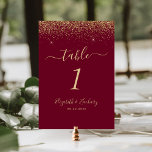 Numeração De Mesa Modern Burgundy Red Gold Glitter Edge Wedding<br><div class="desc">The top edge of this elegant modern wedding table number features a gold faux glitter design. The customizable text combines pale gold-colored handwriting,  copperplate and italic fonts on a burgundy red background.</div>