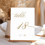 Numeração De Mesa Número 18 de Casamento Caligrafia Romântica Dourad<br><div class="desc">Mesa 18. Por favor,  verifique todos os números disponíveis. | Número de mesa de casamento com caligrafia romântica e elegante com monogramas. Para uma personalização mais avançada deste design,  clique no BOTÃO AZUL DE FERRAMENTA DE DESIGN acima!</div>