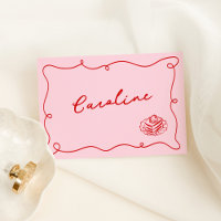 Placa branca, desenhada à mão, rosa e vermelha