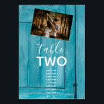 Numeração De Mesa Rustic Blue Wood 2 Fotos Casamento Nomes de Convid<br><div class="desc">Este design apresenta um fundo azul de madeira rústica com uma seleção das suas fotografias de casal pessoal. O fundo azul-rústico de madeira é complementado pelo texto branco e por uma fotografia pessoal de um lado e outra fotografia pessoal do outro. Os tons azuis da madeira criam uma sensação náutica...</div>