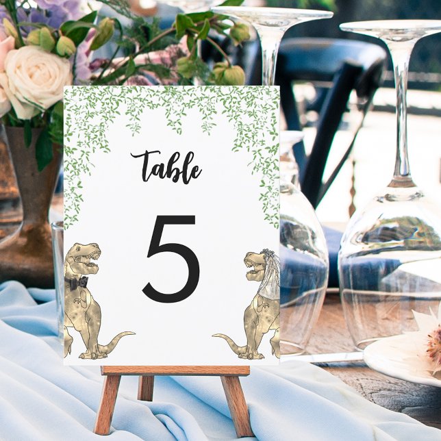 Número de Tabela Personalizada de Casamento de Tem (Dinosaur themed wedding table numbers with T-Rex bride and groom and jungle foliage)