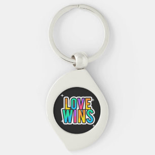 O amor ganha. LGBTQ+Orgulho. Arco-íris. Chaveiro
