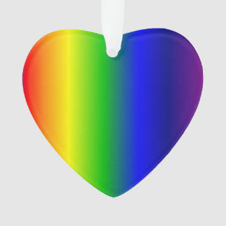 O arco-íris colore o ornamento do coração acrílico