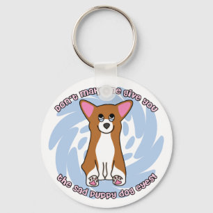 O cão triste Eyes o chaveiro do Corgi de Galês d