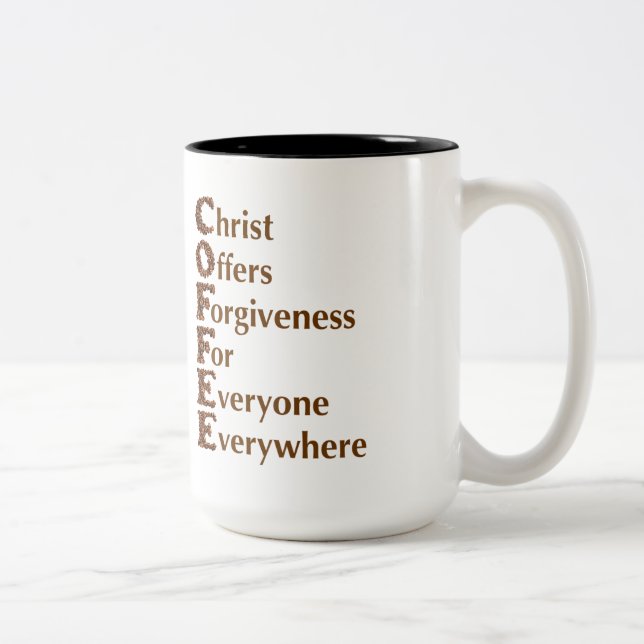 O "cristo oferece a remissão para todos" a caneca (Direita)