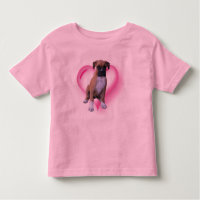 O filhote de cachorro do pugilista caçoa a camisa