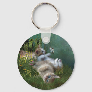 O gatinho deseja o chaveiro da arte