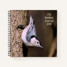 O meu notebook espiral com o Diário de aves
