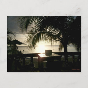 O Sunset jamaicano no cartão postal negativo