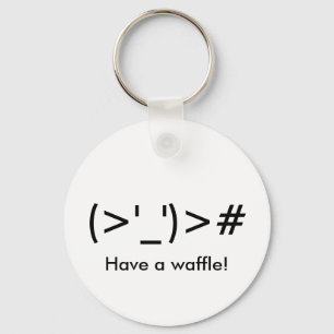 "(> ' _') o ># tem um waffle!" Chaveiro