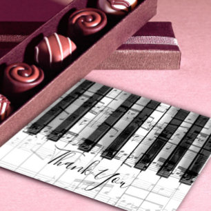 obrigado de caligrafia em notas de piano