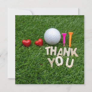 obrigado de golfe com uma bola de golfe e duas cam