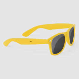 Óculos de sol amarelos com lentes escuras são exib