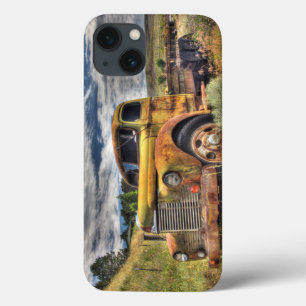 Old truck abandoned in field
