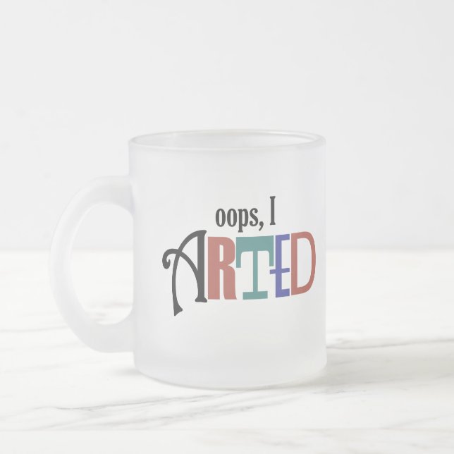 Oops, caneca de I Arted (Esquerda)