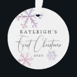 Ornamento Baby Girl First Christmas Pink Snowflakes Photo<br><div class="desc">Cute Christmas ornament for a newborn baby featuring a pink and purple watercolor snowflakes. The elegant script text on the top says "XX's First Christmas." Add a picture on the back of the ornament.</div>