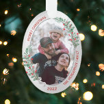 Ornamento Classic Christmas Plants Silver Frame Family Photo<br><div class="desc">The ornament in oval shape has a classic silver frame adorned with Christmas plants and ribbon to display your own special memory of your beloved family. The bright and shiny silver border encircles your photos. The holly, greenery and silk ribbon complete the whole design with a joyful atmosphere of the...</div>
