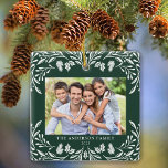 Ornamento De Cerâmica 2 Fotos Família Winter Greenery Natal<br><div class="desc">Este Enfeites de natal quadrado verde-escuro apresenta uma elegante ilustração verde branca de inverno que enquadra a foto horizontal. O design oferece espaço para duas fotos,  uma na frente e outra atrás. Personalize este adorável ornamento de manutenção com seu nome de família e o ano.</div>