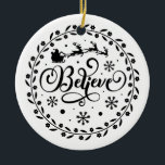 Ornamento De Cerâmica "Acredite" Papai Noel voando no Natal<br><div class="desc">Adicione um toque de magia à sua árvore de Natal com o ornamento cerâmico "Acredite" de Papai Noel voador. Este ornamento maravilhosamente desenhado apresenta o trenó do Papai noel voando pelo céu noturno, espalhando alegria festiva. Perfeito para dar presente ou como adição especial ao seu decoro de férias, este ornamento...</div>