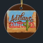Ornamento De Cerâmica Adelanto California Cartoon Desert Retro Viagem<br><div class="desc">Adelanto California neo viagens vintage na engraçada caricatura,  estilo retrógrado com deserto,  cacto e rochas. Azul,  marrom e vermelho com cacto verde.</div>