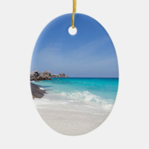 Ornamento De Cerâmica Areia branca semelhante e mar azul-turquesa