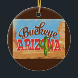 Ornamento De Cerâmica Arizona de Buckeye Viagens vintage do deserto<br><div class="desc">Design neoviagens vintage de Buckeye Arizona em engraçada desenho animado com estilo retrógrado com deserto,  cacto e rochas. Azul,  marrom e vermelho com cacto verde.</div>