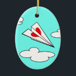 Ornamento De Cerâmica Avião de papel com coração<br><div class="desc">Este avião pequeno romântico foi criado pelo artista canadense Tara Tosh Kennedy.</div>