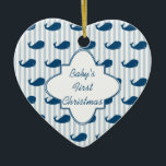 Ornamento De Cerâmica Blue Stripes and Whales Baby's First Christmas Cer<br><div class="desc">Preencha a parte de trás do nosso doce ornamento cardíaco, náutico, chamado Náutico, de Primeiro Natal do Bebê, com os detalhes do seu precioso pequeno para uma guarnição que será tesourada durante toda a vida. Possui um fundo listrado azul pálido na frente e atrás com um padrão de baleia azul...</div>
