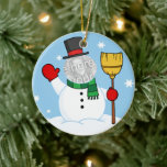 Ornamento De Cerâmica Cartoon Snowman Face Foto<br><div class="desc">Um design de desenho animado bonitinho. Você pode adicionar uma foto de perto do seu filho. Ou você pode mudar a mensagem de Natal "World's Coolest Snowman" nas costas.</div>