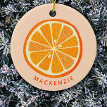 Ornamento De Cerâmica Citrus Orange Personalizado<br><div class="desc">Fruta deliciosa de citrinos cor de laranja em fundo rosa-claro. Um pouco de diversão festiva. Altere o nome para personalizar. Arte original de Nic Squirrell.</div>