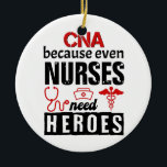 Ornamento De Cerâmica CNA porque até as enfermeiras precisam de heróis a<br><div class="desc">CNA porque até as enfermeiras precisam de heróis design humildes humilhantes para homens mulheres crianças</div>