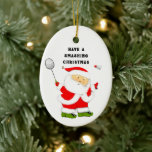 Ornamento De Cerâmica Colecionável de Natal de Badminton<br><div class="desc">Papai Noel engraçado jogando badminton.</div>
