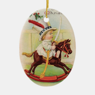 ORNAMENTO DE CERÂMICA CRIANÇA COM CHAPÉU NO CAVALO DE BRINQUEDOS