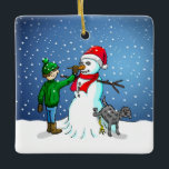 Ornamento De Cerâmica Edifício Snowman<br><div class="desc">O menino construiu um boneco de neve que seu cachorro se sustenta e urina enquanto o menino dá ao boneco de neve um nariz de cenoura.</div>