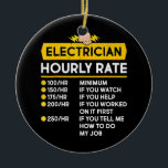 Ornamento De Cerâmica Elétrico Engraçado Taxas Horárias Lineman Gift por<br><div class="desc">Engraçado eletricista com taxas horárias Lineman Gift para os eletricistas presentes. Presente perfeito para seu pai, mãe, pai, homens, mulheres, amigos e familiares no Dia de Ação de Graças, Dia de Natal, Dia de as mães, Dia de os pais, 4 de julho de 1776 Dia Independente, Dia dos Veteranos, Dia...</div>