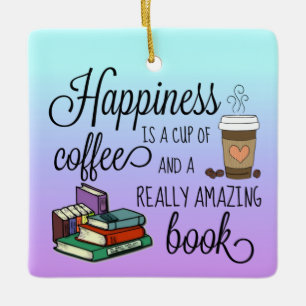 Ornamento De Cerâmica Felicidade é uma taça de café e um livro incrível