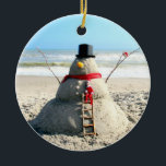 Ornamento De Cerâmica Florida Snowman Ornament<br><div class="desc">Snowman on the back, Snow woman on the back -- or should I say a sandman and sand woman - because we don't get snow here ... let me tell you shoveling sand is just as tough as shoveling snow - but at least for us it's a choice and not...</div>