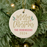 Ornamento De Cerâmica Foto da família personalizada de script Dourado Fe<br><div class="desc">O ornamento de Natal de na moda Merry contém escrevendo antigo de guião de ouro e sotaque de galhos verdes com folhas e bagas vermelhas. Personalize com nome personalizado / família e texto do ano e adicione uma foto da família favorita ao lado oposto. A cor de fundo bege neutro...</div>