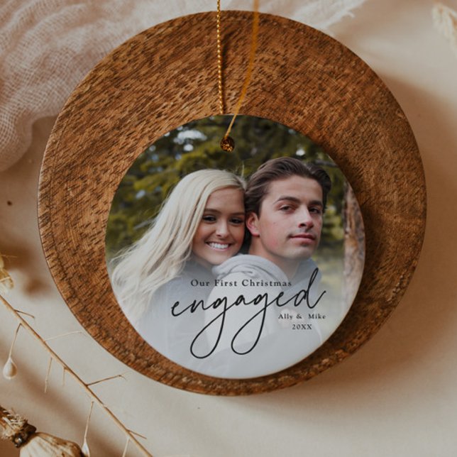 Ornamento De Cerâmica Foto manuscrita de Natal (Elegant black script first christmas engaged 2 photo christmas tree holiday ornament.)
