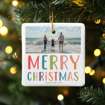 Ornamento De Cerâmica Foto simples e colorida da família de Natal feliz<br><div class="desc">Esta família simples e divertida O ornamento de Feliz Natal é um lugar para você adicionar seus nomes, com "Feliz Natal" em tipografia brilhante colorida, assim como espaço para você adicionar sua própria foto de paisagem. Nas costas há uma design colorida de bolinhas. A decoração minimalista e moderna de Natal...</div>