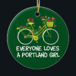 Ornamento De Cerâmica Garota Portland Bonita<br><div class="desc">Um presente fofo em Portland,  Oregon,  com uma bicicleta vintage decorada com flores e "Todos Amam uma Garota Portland" escrito em verde. Esta bonito lembrança faz um belo presente para um hipster na maior cidade!</div>